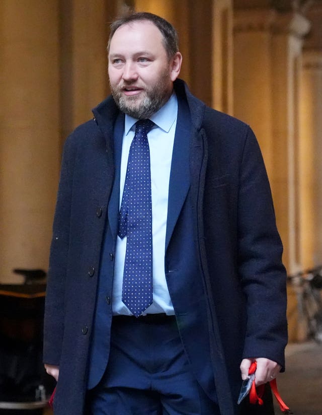 Ian Murray walking outside
