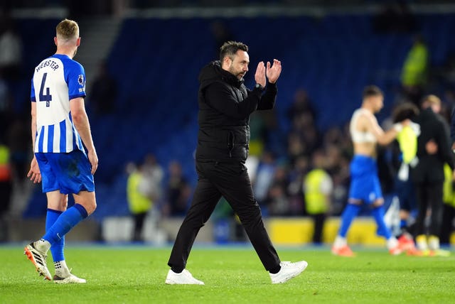 Brighton manager Roberto De Zerbi applauds the club''s supporters at full-time