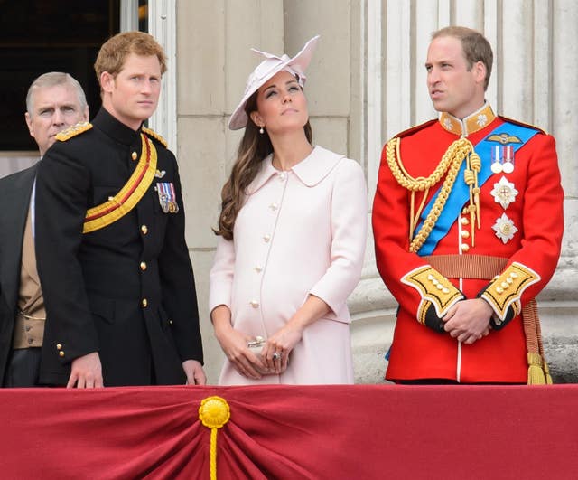 Prince Harry, the Duchess of Cambridge who was pregnant with Prince George, and the Duke of Cambridge on the balcony of Buckingham Palace following the 2013 Trooping the Colour parade (Dominic Lipinski/PA)