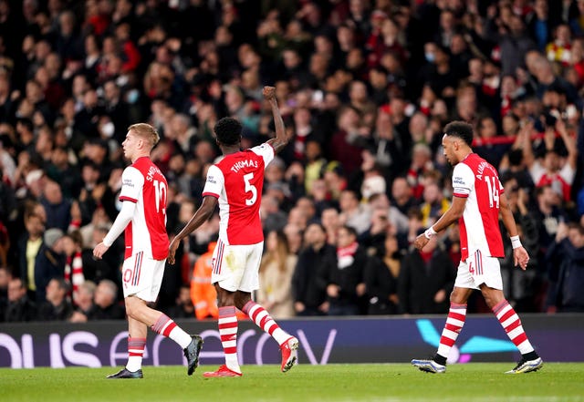 Arsenal goalscorers Emile Smith Rowe, Thomas Partey and Pierre-Emerick Aubameyang, l-r