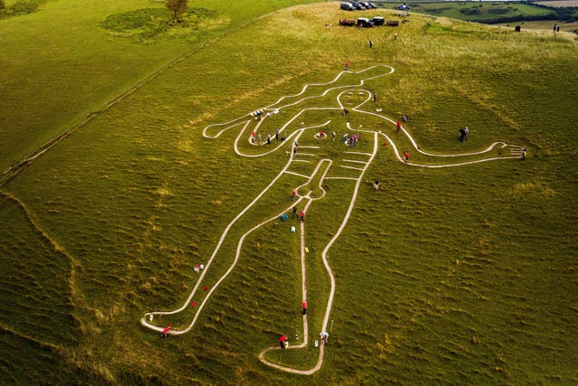 Cerne Abbas Giant cleaning