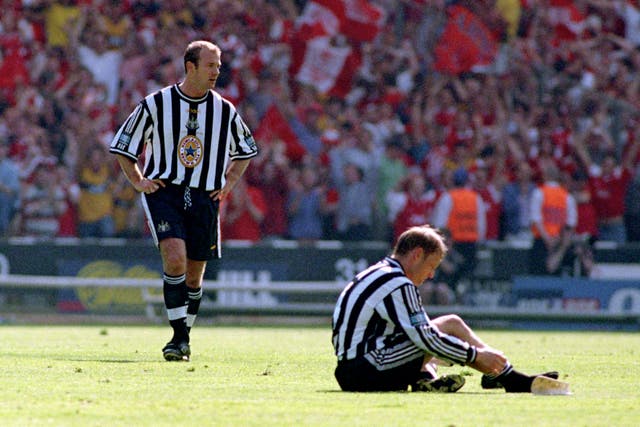 Dejection for Newcastle’s Alan Shearer (standing) and David Batty after a 2-0 FA Cup final defeat by Arsenal