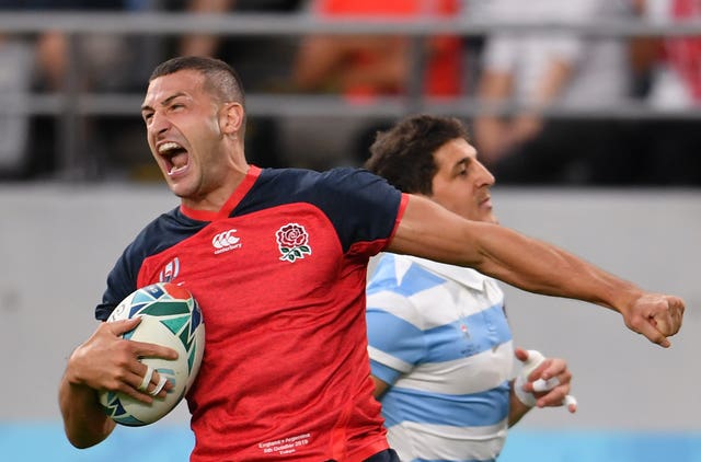 Jonny May scores the opening try in the crucial Pool C match against Argentina