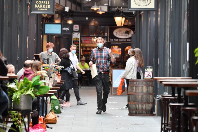 A customer walking through Cardiff