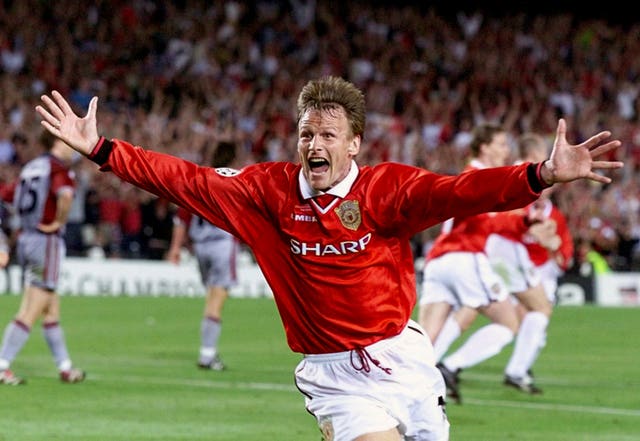 Manchester United's Teddy Sheringham celebrates against Bayern Munich (PA)