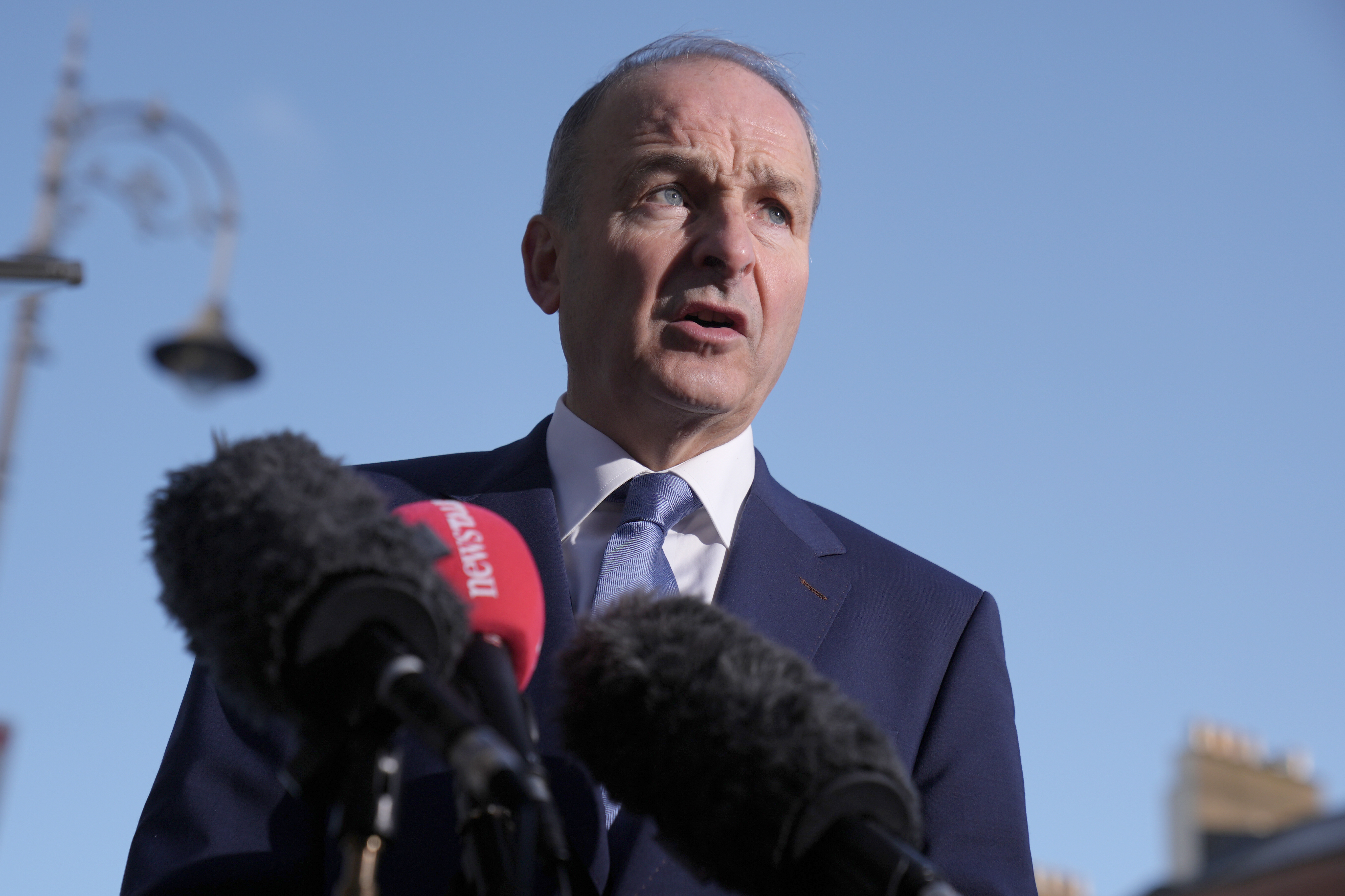Tanaiste and Fianna Fail leader Micheal Martin speaking to the media as he arrives at Government Buildings, Dublin
