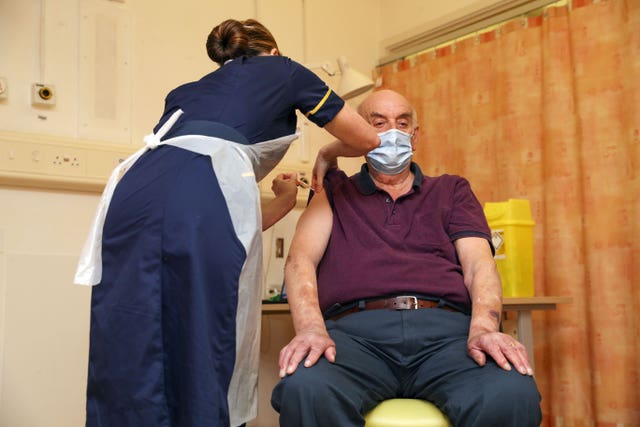 Brian Pinker receives the Oxford vaccine