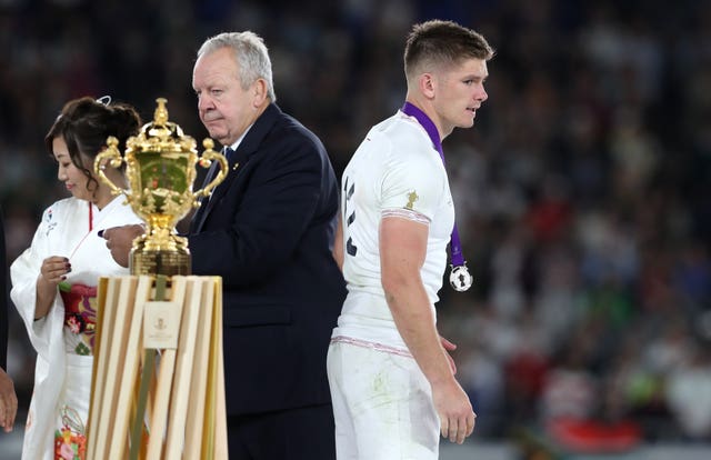 Owen Farrell walks past the Webb Ellis Cup