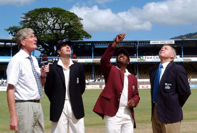 Willis, now a Sky presenter and pundit, watches with England captain Michael Vaughan as West Indies captain Brian Lara tosses a coin in 2004