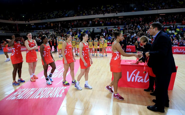 England's Laura Malcolm receives her series medal at the Copper Box