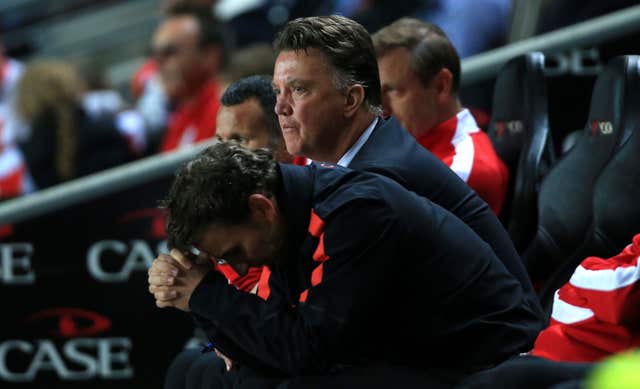 Louis van Gaal shows his dejection during defeat to MK Dons