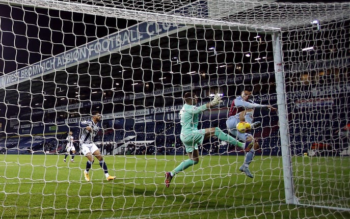 Anwar El Ghazi, right, scores Aston Villa’s first goal