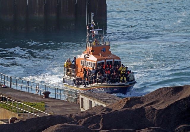 A group of people thought to be migrants are brought in to Dover (Gareth Fuller/PA)