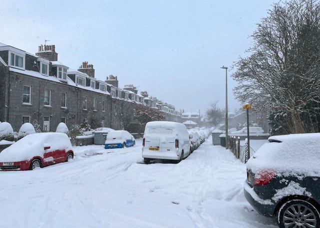 Snow on cars in Aberdeen
