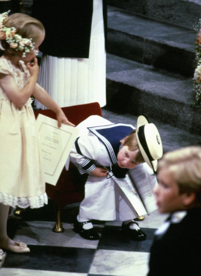 Six year-old Laura Fellowes points at her cousin Prince William at the Duke of York's wedding (PA) 