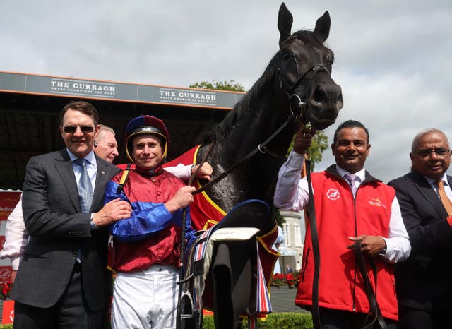 Aidan O’Brien and Ryan Moore with Camelot after winning the Irish Derby
