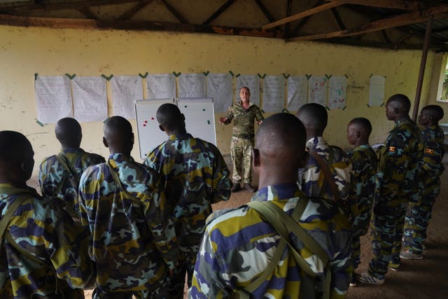 Corporal Chris Carmichael briefs Ugandan Marines in Entebbe, Uganada