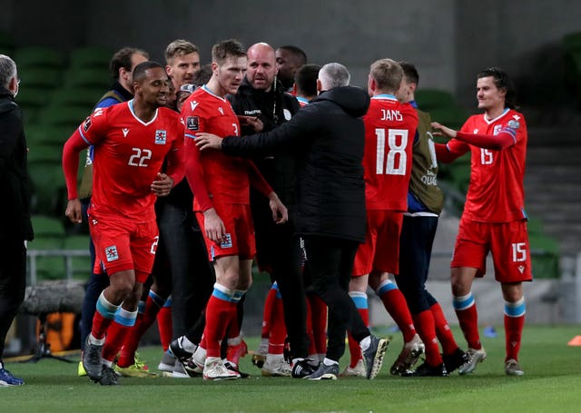Luxembourg players and staff celebrate in Dublin 