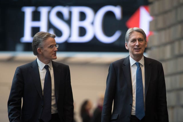 Chancellor Philip Hammond arrives at HSBC UK headquarters in Canary Wharf, east London with CEO John Flint (Stefan Rousseau/PA)