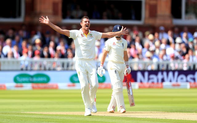 Josh Hazlewood celebrates taking the wicket of Joe Root