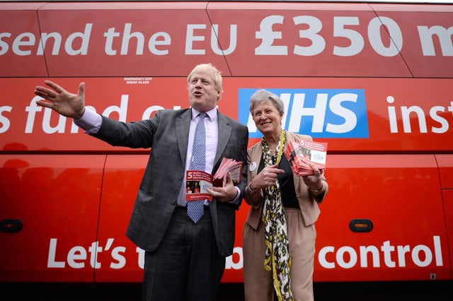 Foreign Secretary Boris Johnson stands in front of the Vote Leave campaign bus, which toured the country during the EU referendum 
