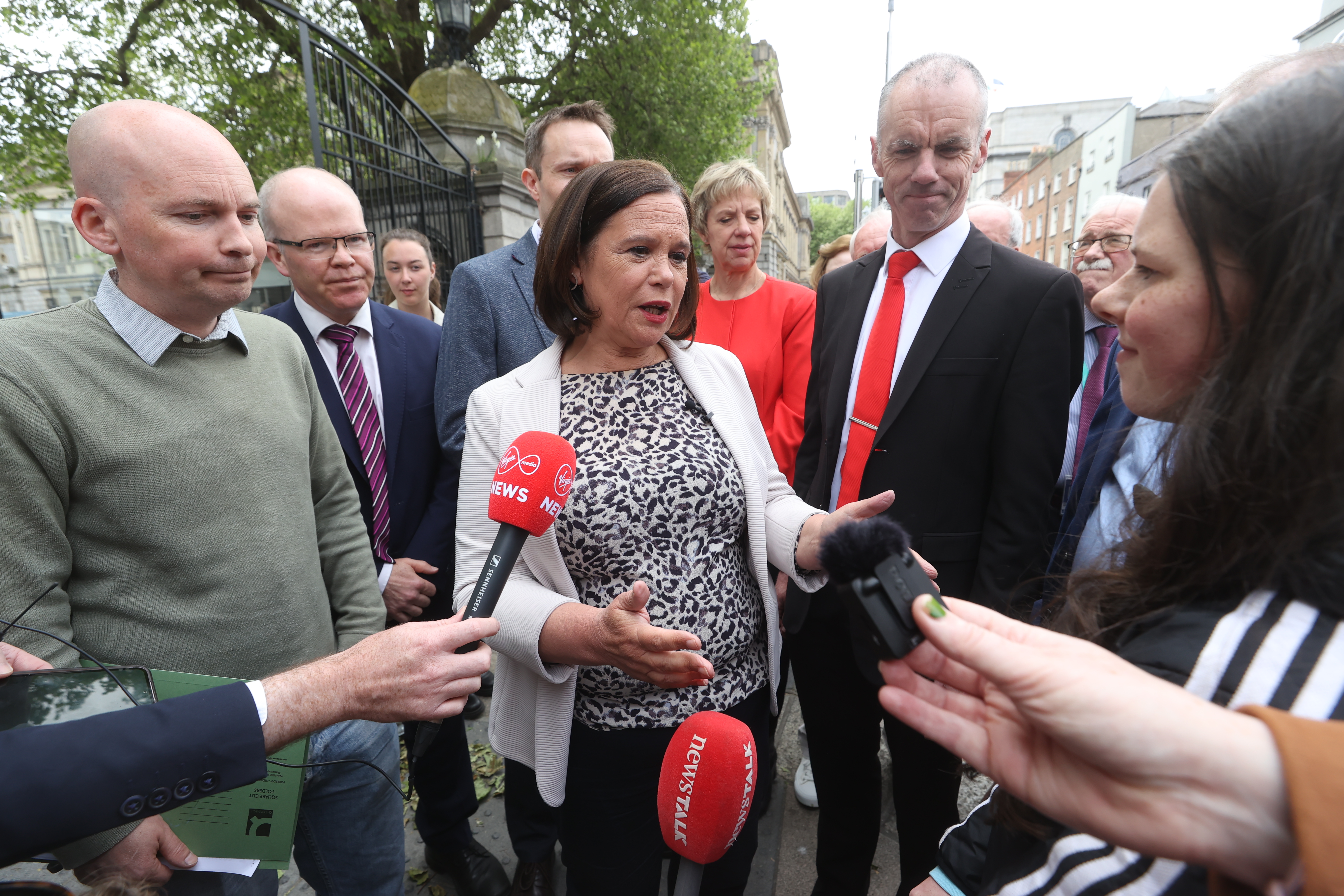 Cara Darmody with Sinn Fein leader Mary Lou McDonald and other opposition leaders outside the Dail