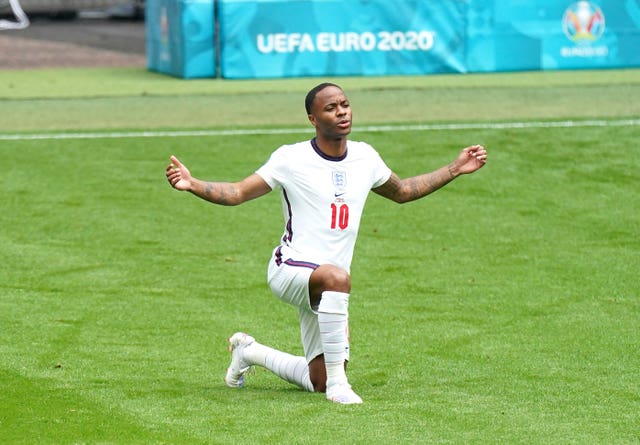 Raheem Sterling takes a knee at Wembley