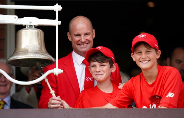 Andrew Strauss with sons Luca and Sam, dressed in red in aid of the Ruth Strauss Foundation, on day two of the Ashes Test at Lord's