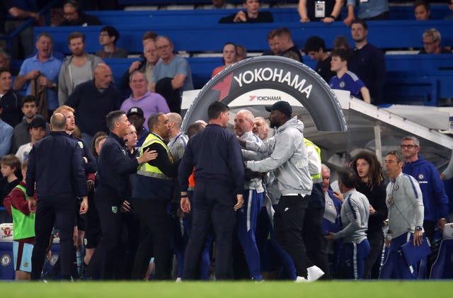 Tempers flare on the touchline after the match 