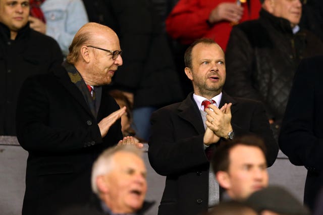 Manchester United's owner Joel Glazer (left) and vice chairman Ed Woodward at Old Trafford. (PA)
