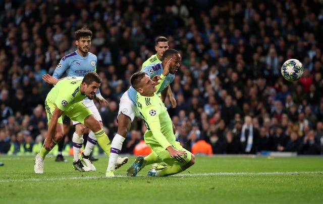 Raheem Sterling scores his side's first goal 