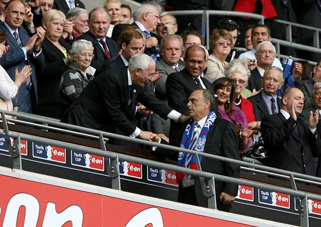 Avram Grant collects an FA Cup runners-up medal with Portsmouth