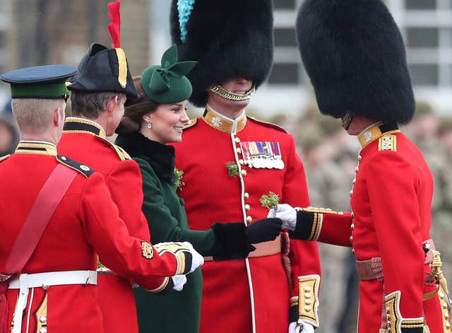 The Duchess of Cambridge presents a shamrock to officers and Guardsmen (Jonathan Brady/PA)