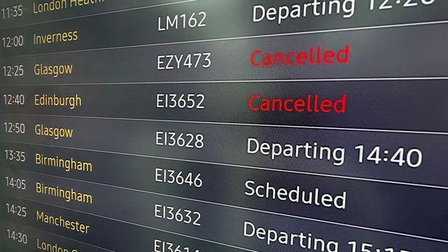A flight departure board showing cancelled flights to Scotland, at George Best Belfast City Airport