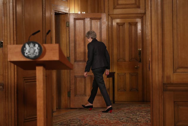 Theresa May leaves room