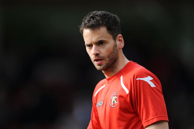 Ben Purkiss' right to be PFA chairman has been challenged by Gordon Taylor after rejoining Walsall on non-contract terms