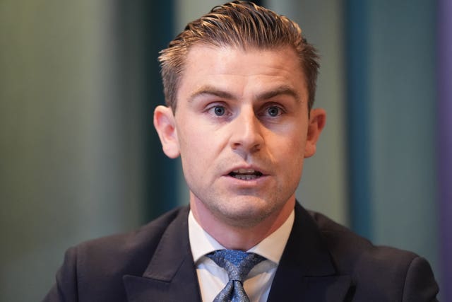 Headshot of Darragh Mackin speaking