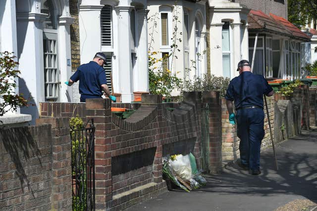 Police officers search Chestnut Avenue in Forest Gate, east London, where 18-year-old Sami Sidhom was fatally stabbed (Stefan Rousseau/PA)