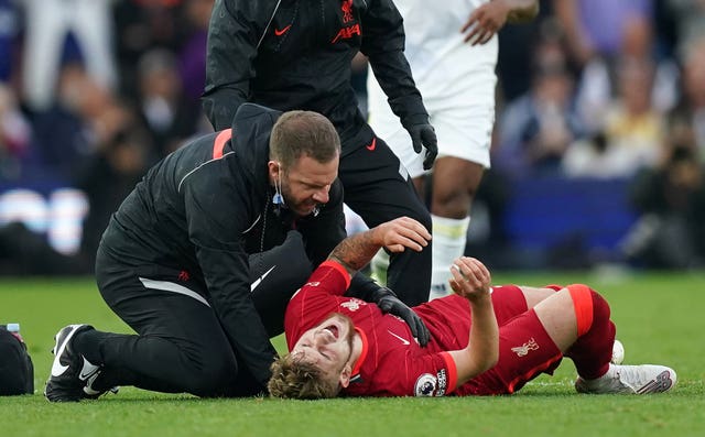 LIverpool midfielder Harvey Elliott is treated by a physio