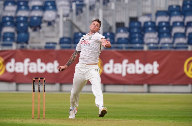 Brydon Carse bowling