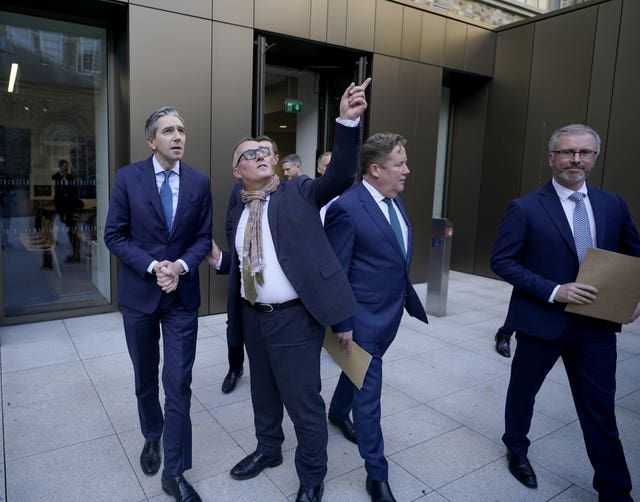 (left to right) Taoiseach Simon Harris, David McRedmond, independent chair of the Dublin City Taskforce, Housing Minister Darragh O’Brien and Minister for Children and Green Party leader Roderic O’Gorman at the General Post Office, Dublin