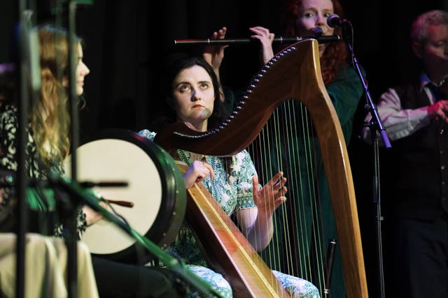 Musicians perform during a visit by Irish President Catherine Connolly to the Irish Cultural Centre in Hammersmith