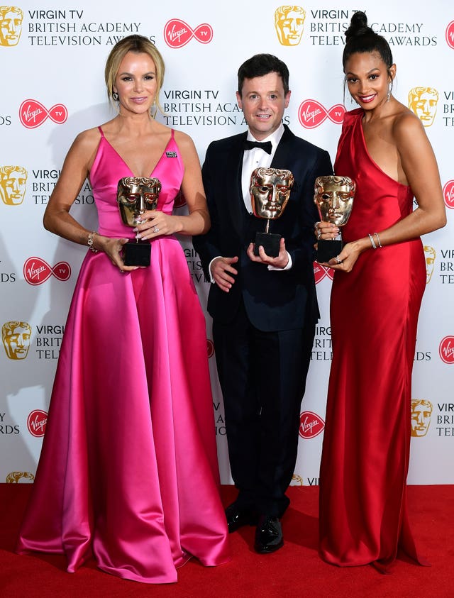 Declan Donnelly, Alesha Dixon and Amanda Holden collect the award for best entertainment programme for Britain’s Got Talent (Ian West/PA)