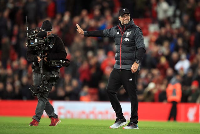 Leaders Liverpool come from behind to beat Tottenham at Anfield
