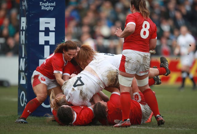 Second row Poppy Cleall scored a hat-trick of tries in England's 66-7 rout of Wales at Twickenham Stoop