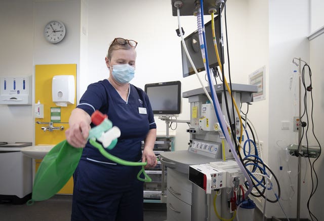 Charge nurse Katy Currie sets up equipment