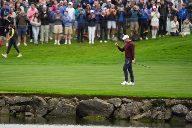 Rory McIlroy celebrates his birdie on the 18th in round three of the Irish Open