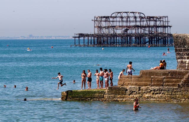 Sun-seekers at Brighton beach on August 7