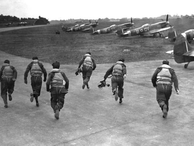 The aerodrome at Biggin Hill, the front line airfield in the Battle of Britain, during a repeat performance of a 'scramble' by some of the fighter aces of 1940 (PA)