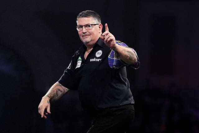 Gary Anderson celebrates